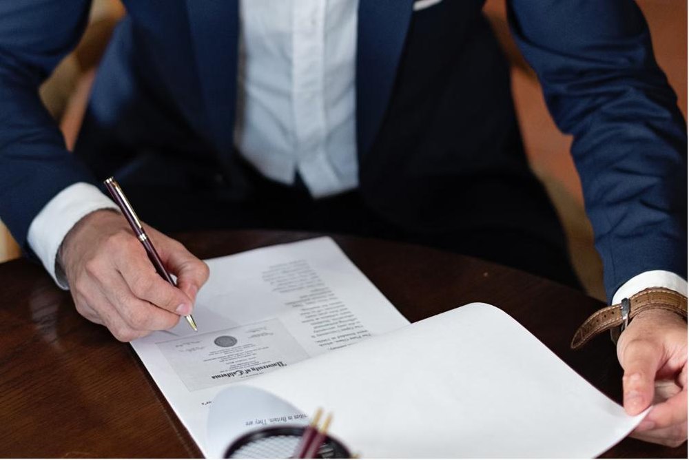 Reviewing and signing construction deal documents