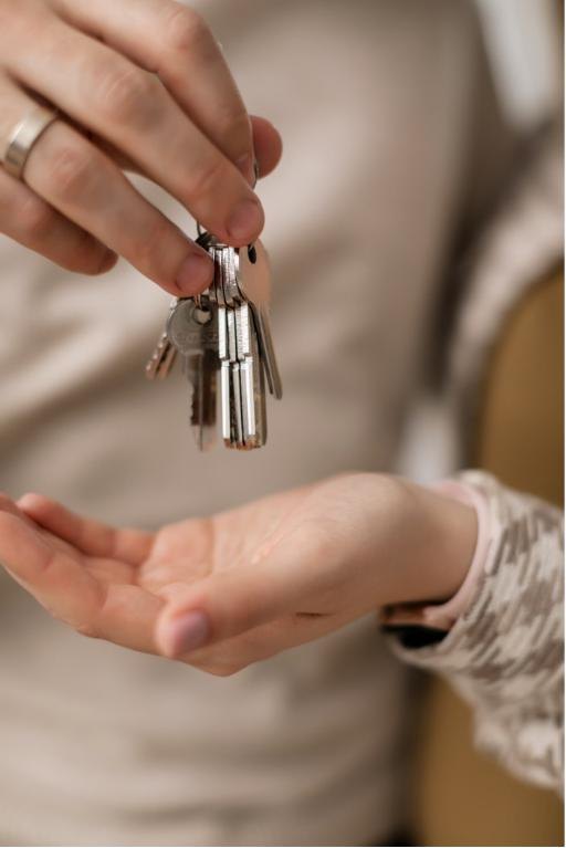 Keys being handed to a new tenant